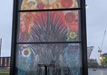 Image of a glass window by the Riverside showing the Iron Throne from Game of Thrones