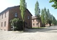 Auschwitz buildings and uneven ground