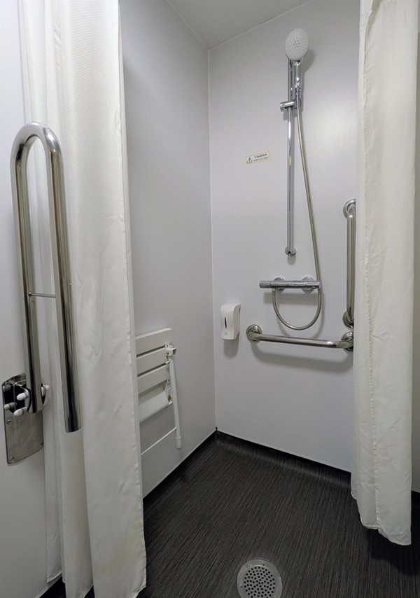 Image of the wet room shower and shower seat