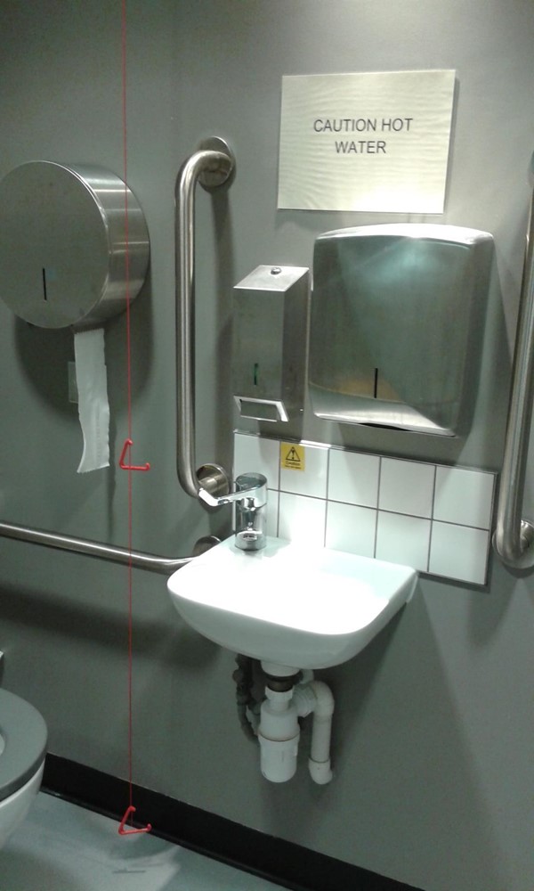 Ample space around sink area. pull cord on left hand side of the toilet, lever action taps for ease