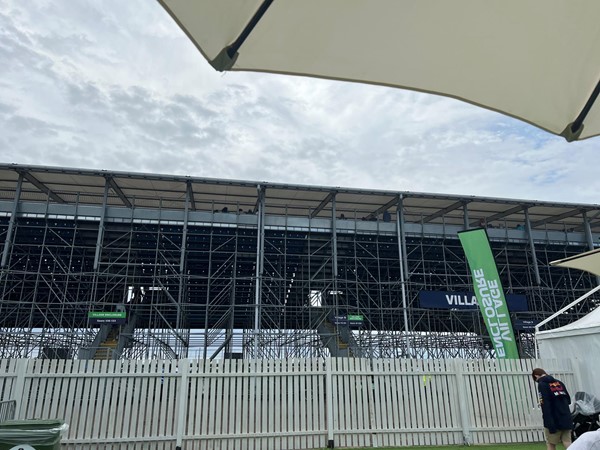 Stairs to grandstand. The main stairs have rails. Steps to seats are do not have rails, beneficial to book lower seats in stand