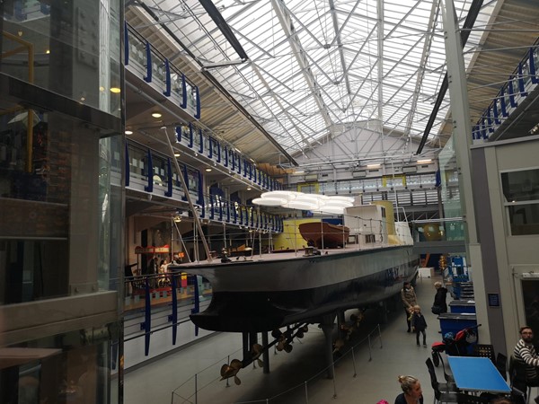 Shows all the floors of the museum and the Turbinia Boat which sits in the center