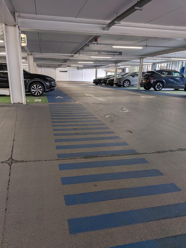 image of walkway across the car park to the electric vehicle charging points