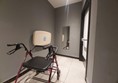 Image of a walking aid in a hallway