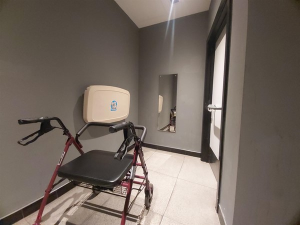 Image of a walking aid in a hallway