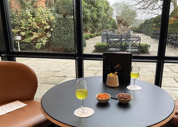 Image of a table with a drink on it