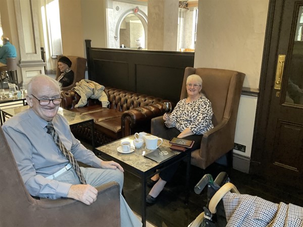 Image of two people at a table