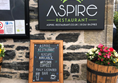 Aspire restaurant sign