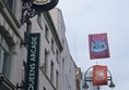 image of sign for Queens Arcade