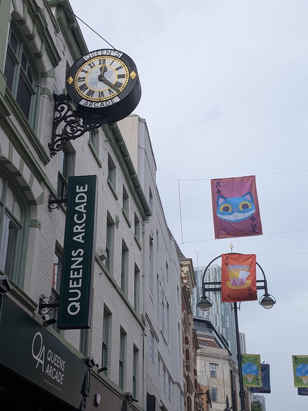image of sign for Queens Arcade