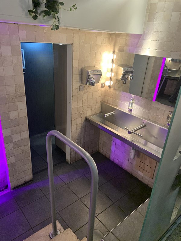 Image of a sink and hand driers