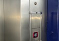 Image of lift buttons. The lift buttons have Braille Markings