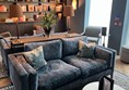 Image of two sofas back to back