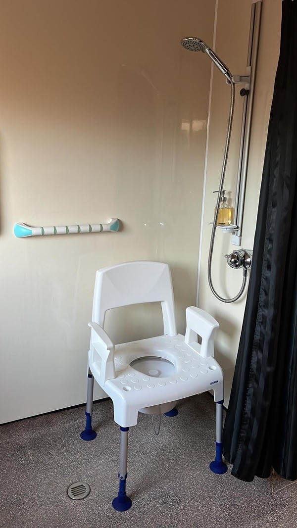 Wet room with shower chair