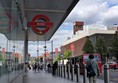 Image of bus station with buses sign