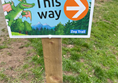 Sign saying "This Way"