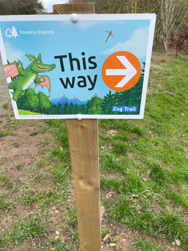Sign saying "This Way"