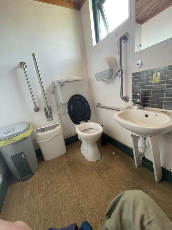 Accessible WC, spacious but tired