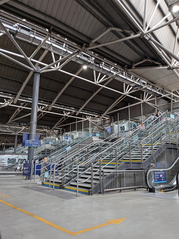 image of stairs and escalators to upper level