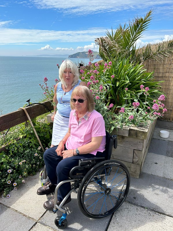 Sat on terrace overlooking the sea