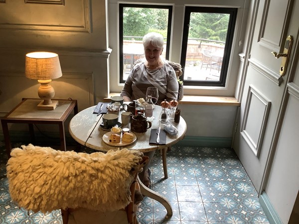Picture of a person sitting in the dining area