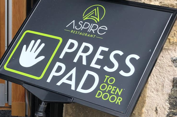 Press pad to open door