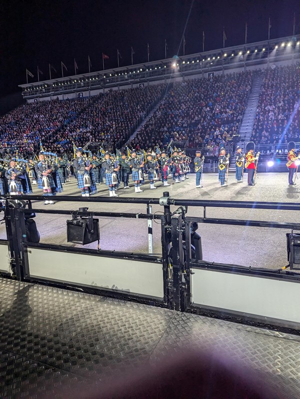 Image of a pipe band on a stage