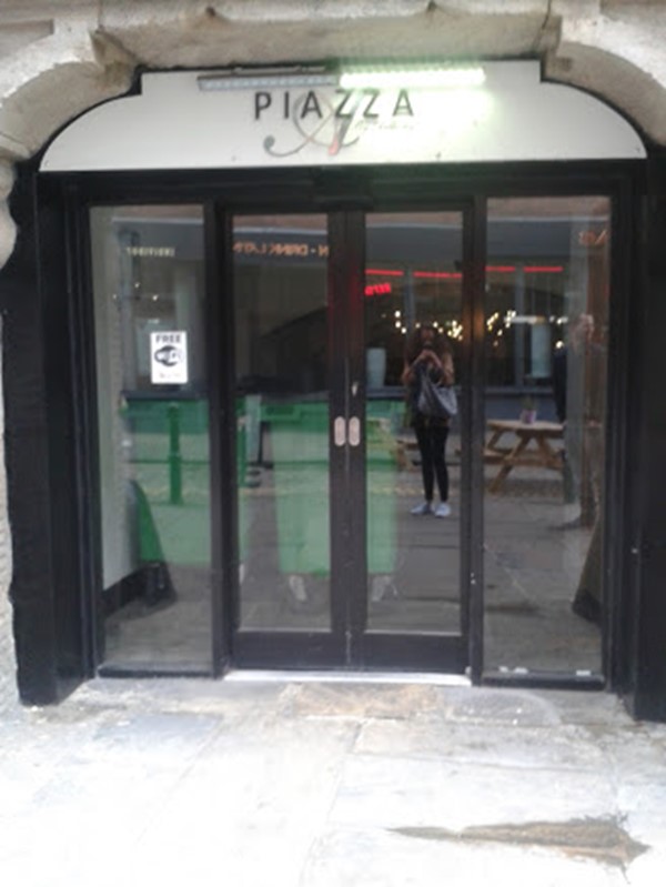 PIcture of Leeds Corn Exchange - Entrance, you can see the bins