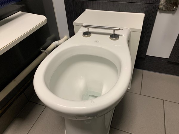 Toilet with toilet seat missing