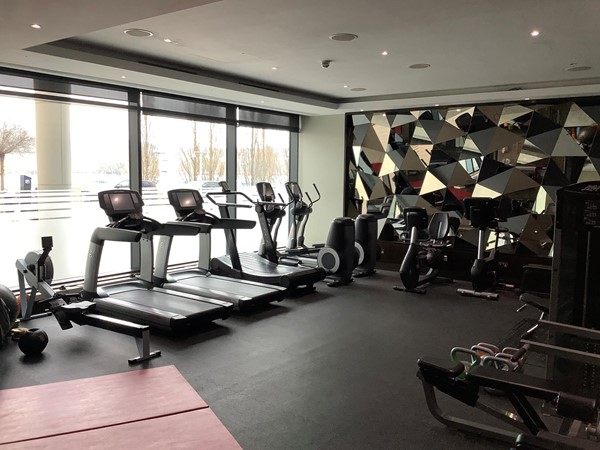 Hotel health club fitness suite with fitness equipment