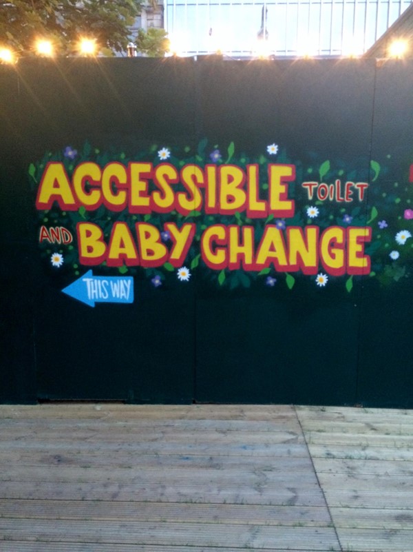 Clear and colourful signage to accessible loos.