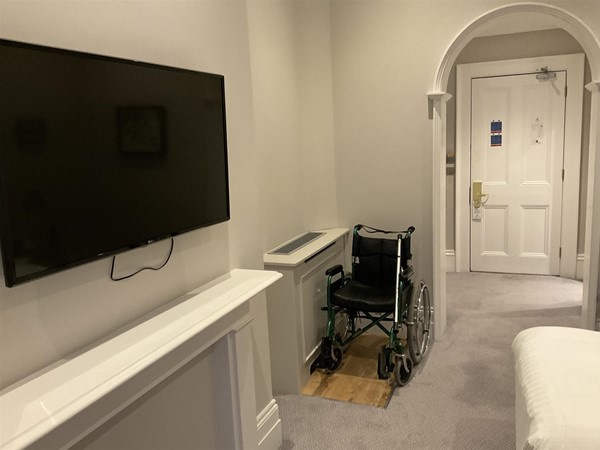 Image of a wheelchair in a room.