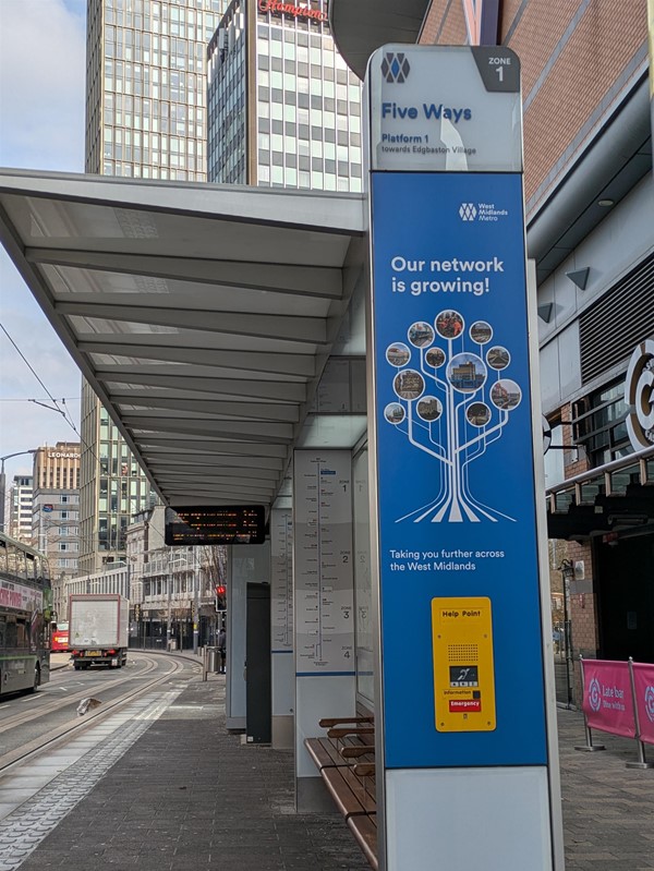 Image of tram platform and emergency button