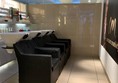 Image of the sink area. There is about a metre between the chairs and the wall infront so transferring would be easiest at the end chair