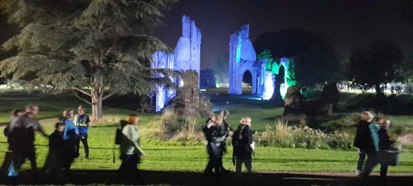 Picture of Glastonbury Abbey lit up purple