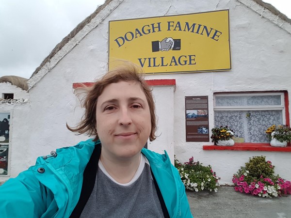 On my scooter at the entrance to Doagh Famine Village