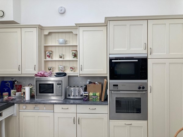 Kitchen with ‘rise and fall’ units.