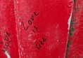 Image of writing on the wall reading Love is Free