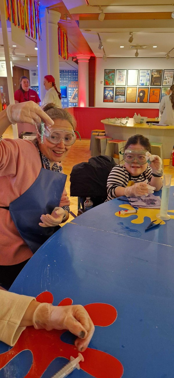 Euan's Guide team at the slime station.