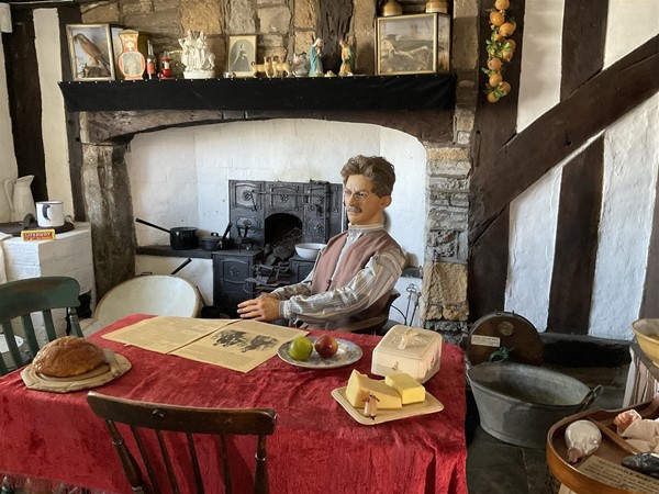 Image of a mannequin at a desk