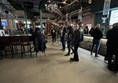 The bar area has various seating arrangements with high and low tables. Good wide spaces
