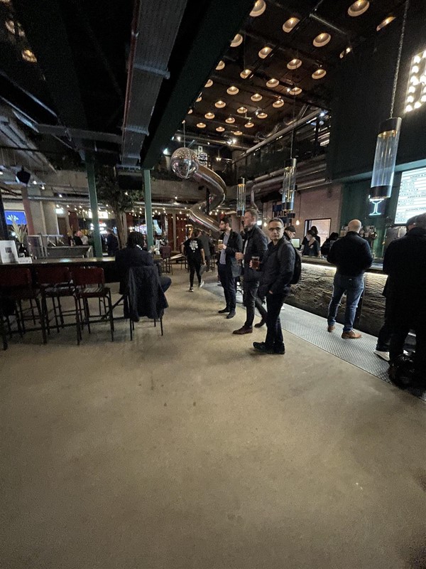 The bar area has various seating arrangements with high and low tables. Good wide spaces