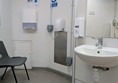 Image of sink, soap dispenser, hand dryer and paper towel dispenser