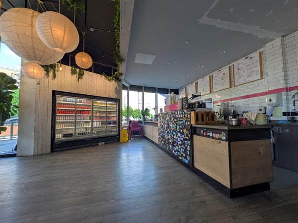 Image of fridge and serving counter