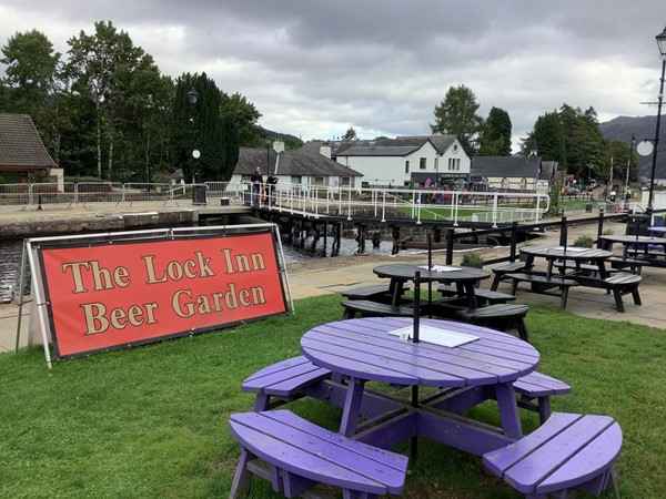 When it’s open for crossing, there are just a few shops ahead, with usual tourist items on sale, then afterwards, turn up alongside the canal and its five locks, and head for a G and T.