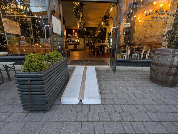 Image of entrance with bi-fold ramp