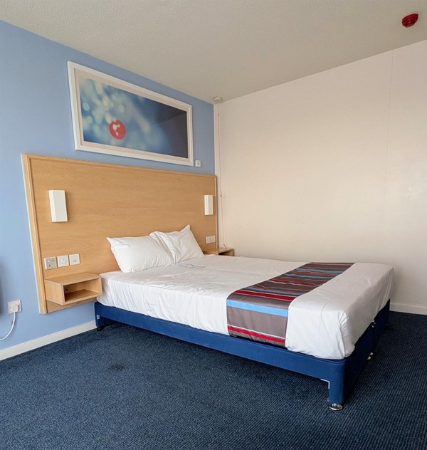 Image of the bed from the side