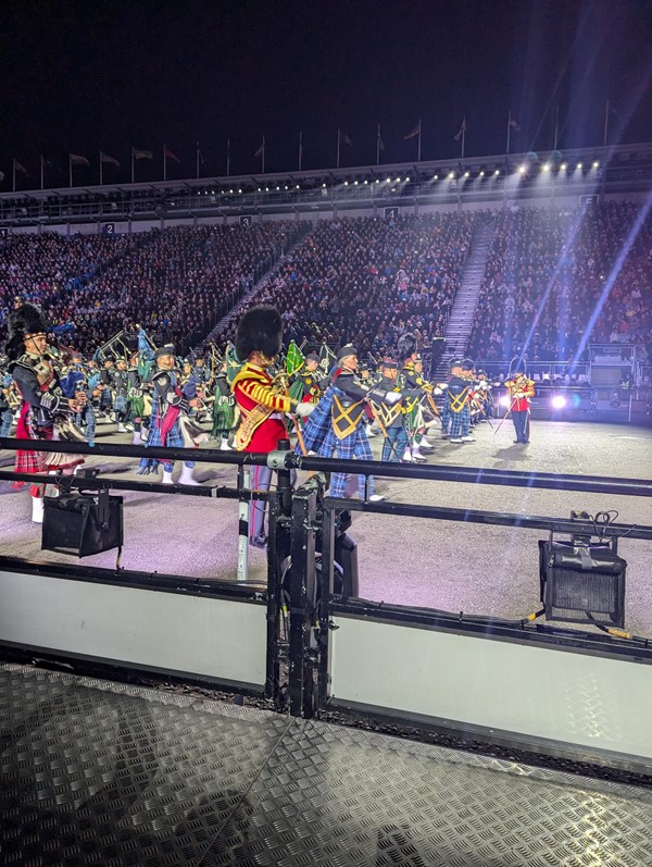 Image of a pipe band on a stage