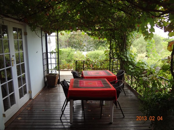 Picture of Impangele Gust House - The breakfast deck ... awesome in summer with hummingbirds all around you :)