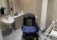A roomy bathroom, although the sink was a bit low to get the wheelchair under it